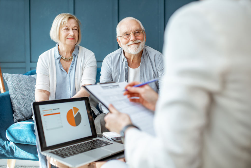 Happy,Senior,Couple,During,The,Meeting,With,Agent,Or,Financial